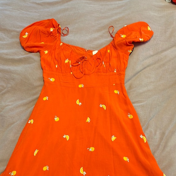 Astr Dresses & Skirts - Orange Puff Sleeve Dress with Floral Accents